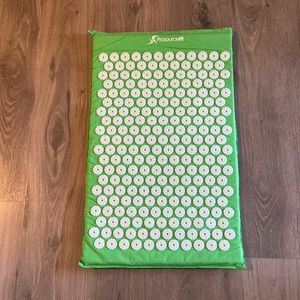 ProSource Fit Back mat to lay on. Relieves back pain with accupressure points.